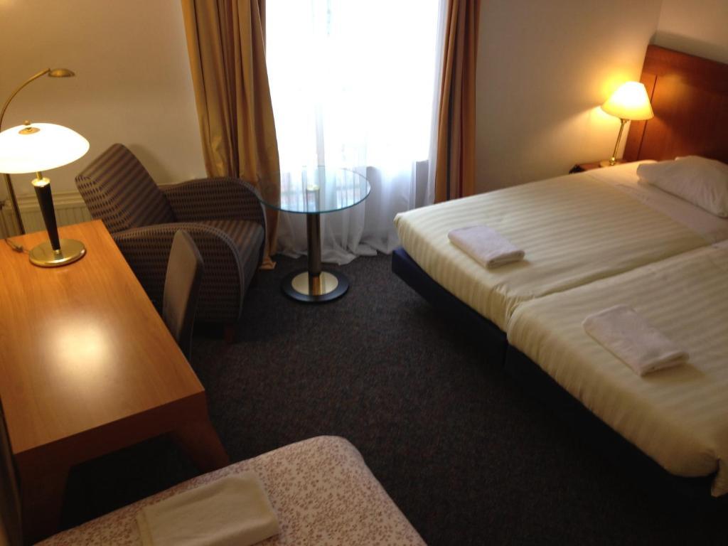 Hotel Alfa Amesterdão Quarto foto