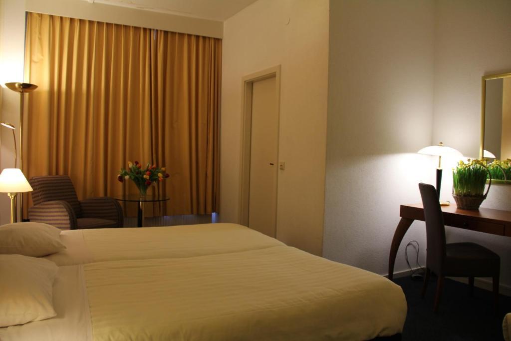 Hotel Alfa Amesterdão Quarto foto